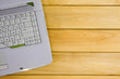 © Роман Заворотный - laptop on a wooden background top view