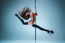 Woman Pole Dancing