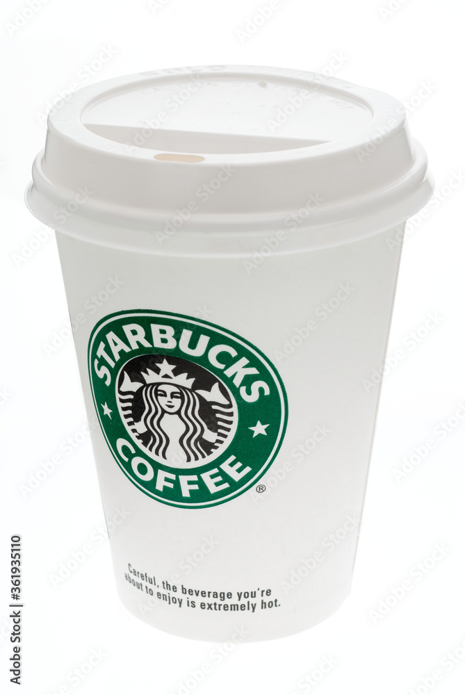 London, England - January 22, 2010: Starbucks Coffee Cup , Starbucks is the  largest coffeehouse company in the world, Founded in Washington, 1971.  Stock Photo | Adobe Stock