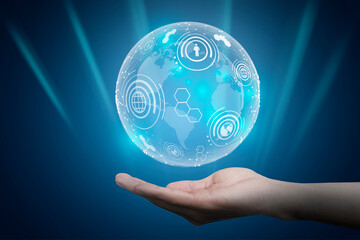 Poster - Hand Holding Holographic World Globe With Web Icons, Blue Background