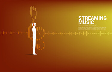 Poster - Vector silhouette of man standing with headphone and music note equalizer wave.background for streaming music and digital song.