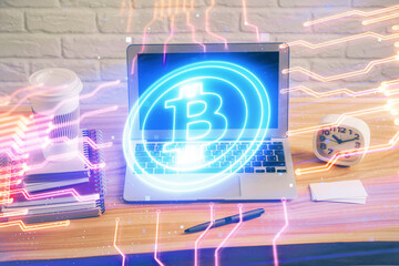 multi exposure of blockchain theme hologram and table with computer background. concept of bitcoin c