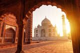 Fototapeta Natura - The magnificent Taj Mahal in India shows its full splendor at a glorious sunrise.