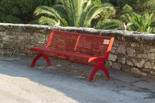 Two Turtledoves And A Red Bench