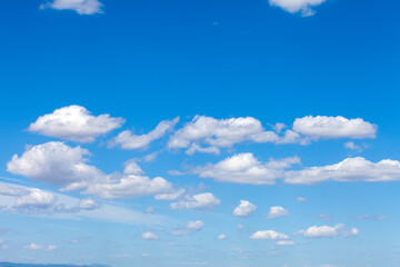 Blue sky with clouds on sunny day