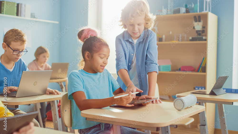 Elementary School Computer Science Class: Smart Girl Uses Digital ...