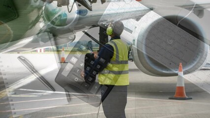 Poster - Male airport worker working against calculator, coffee cup and keyboard