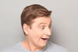 © Andrei Korzhyts - Portrait of funny happy impressed man with widened eyes and open mouth