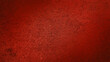 dark red stucco wall texture background, grungy and grainy texture. abstract rustic christmas concept background.