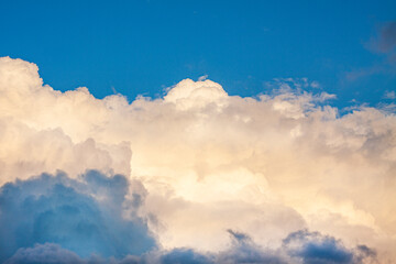  beautiful white and blue fluffy clouds in a bright sunny weather