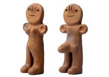 Ancient Clay Male And Female Figurines From Canary Islands Isolated On White Background