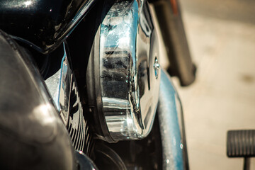 Closeup of a motorcycle  parked in the street