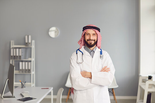 Arabian male doctor pediatrician standing in the white office of the hospital.