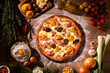 Sweet pizza with peaches, fig and pineapple on wood background. Top view, close up. Traditional Brazilian Pizza