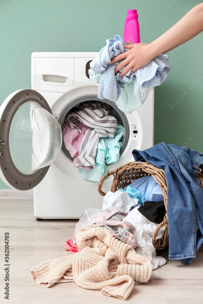 Woman doing laundry at home