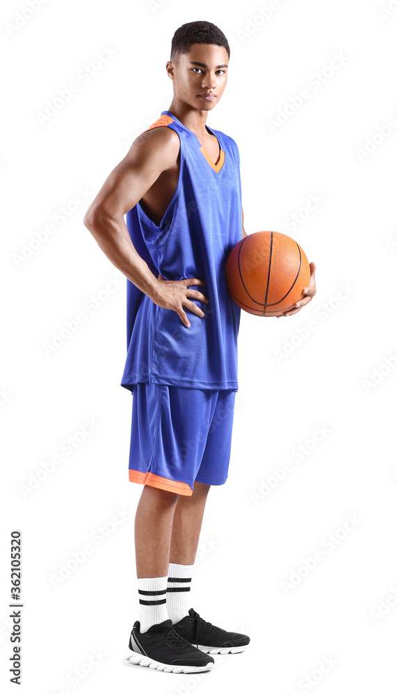 Young African-American basketball player on white background
