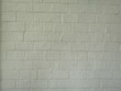 © pakn - brick block wall show Pattern stack block rough surface texture material background Weld the joints with cement grout white color paint