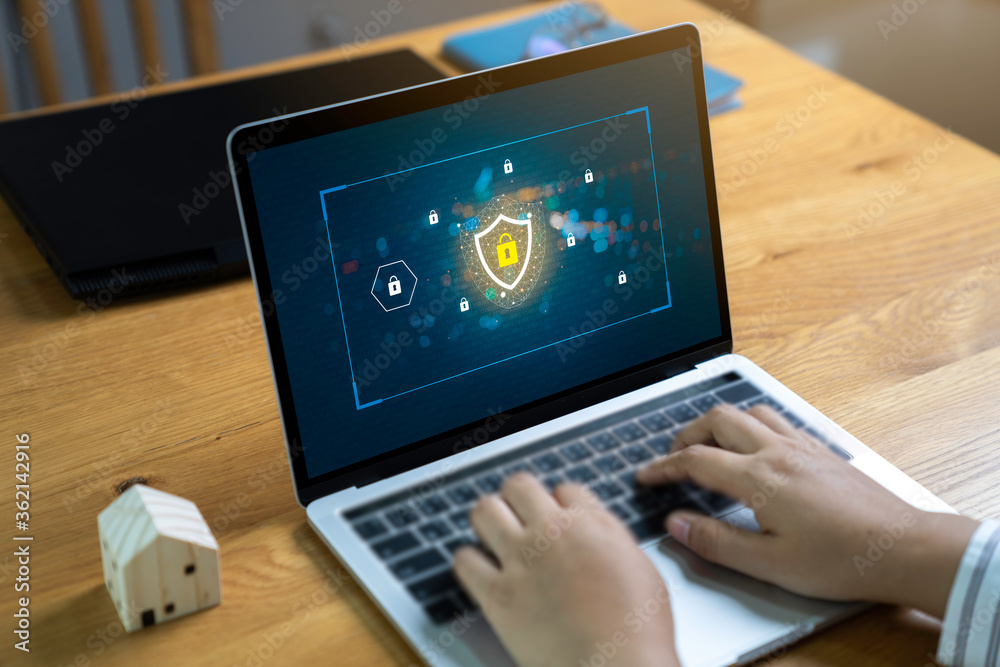 Person using a Laptop Computer with data protection, Cyber security ...