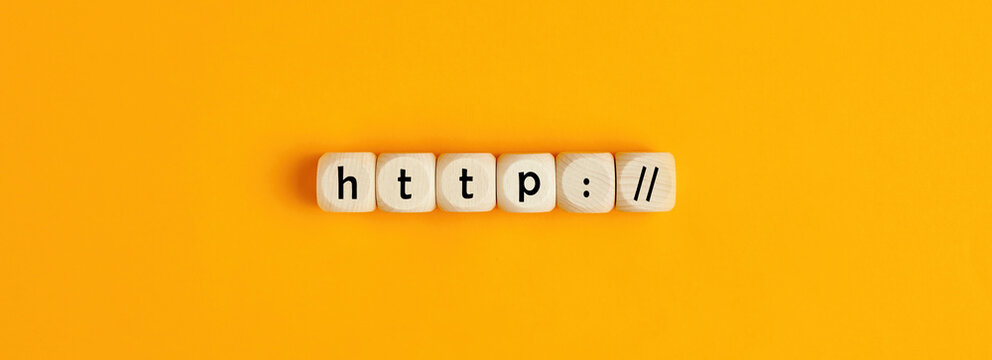Word http on wooden blocks on yellow background.