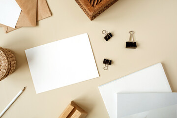 Wall Mural - Blank paper sheet. Webbing invitation card. Flat lay, top view mockup with empty copy space