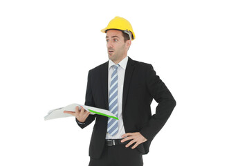 Handsome and smart engineer or architecture in black suit Wearing a yellow safety engineer hat with hand holding construction drawing papers and serious in work isolated on yellow background.