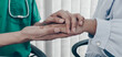 © Puwasit Inyavileart - Doctor shook hands to comfort the male patient in the hospital room.