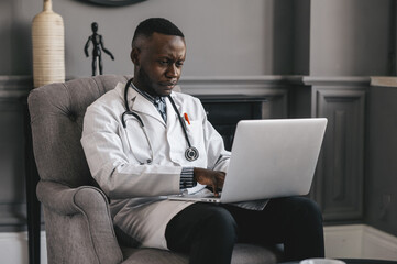 an African American doctor provides Telemedicine consultations through the transmission of medical information via telecommunications channels