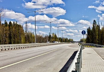 Modern highway infrastructure. Transportation road system. Highway flat asphalt surface. Highway car drive. Traveling by car. Motorway system. Transportation business. Autobahn roads.