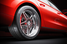 Wheel Of Red Sports Car Closeup In Studio Lighting 3d
