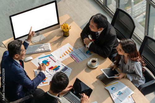 Cuadros en Lienzo Smart businessman and businesswoman talking discussion in group meeting at office table in a modern office interior