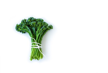 Fresh broccolini isolated on white background with copy space.