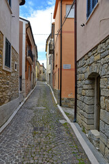 A street between the houses of the old town of Santa Maria del Molise, Italy.