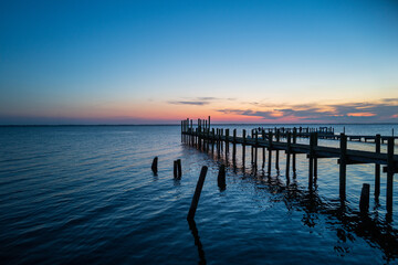 Wall Mural - Sunset over a Fishing Pier