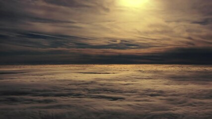 Wall Mural - moody view moving across the stratosphere in golden twilight sun