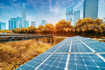 Wall Mural - ecological energy renewable solar panel plant with urban landscape landmarks