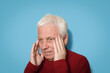 © Solarisys - White haired man having headache