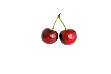 ripe sweet cherries on a white background. front view