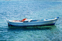 Small Fishing Boat In The Sea 