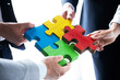 © alotofpeople - Business people and puzzle pieces