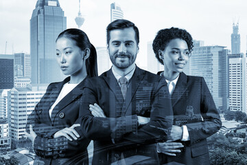 Front view of three successful smiling business consultants standing in a row in suits and ready to tackle with customer problem. Kuala Lumpur cityscape. KL skyscrapers. Double exposure.