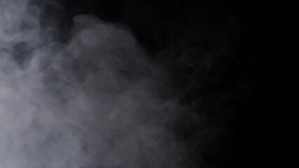Wall Mural - flowing fog, mist, haze, vapor, fire smoke on black background
