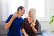 © Angelov - Man and woman eating a pizza and enjoying the evening