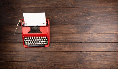 Wall Mural - Vintage typewriter and a blank sheet of paper,Writer or journalist workplace
