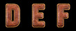 Set of leather letters D, E, F uppercase. 3D render font with skin texture isolated on black background.