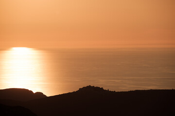 Sticker - Sunset over the village of Sant'Antonino and Mediterranean