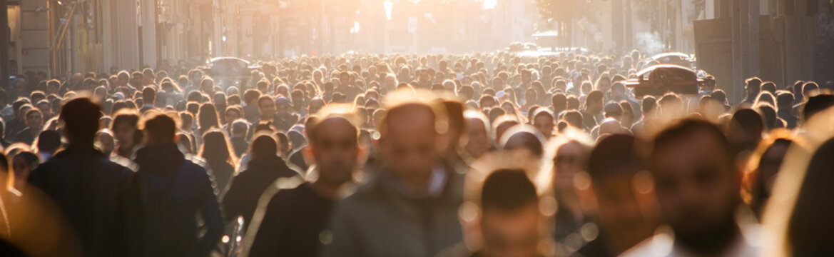 Fototapete - Blurred crowd of unrecognizable at the street