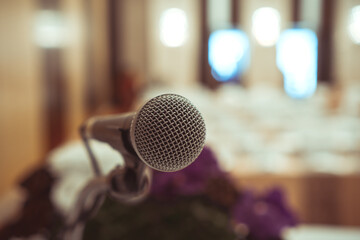 Wall Mural - Microphone for speaker of speech or speaking at seminar conference room, talking for lecture to audience university, Event light convention hall in Business Talk speaking in training