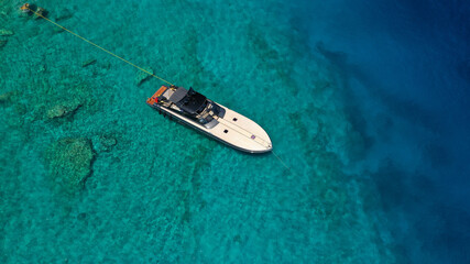 Wall Mural - Aerial drone photo of luxury speed boat anchored in paradise turquoise sea bay