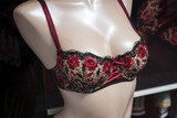 Fototapeta Sypialnia - closeup of red and black underwear on mannequin in fashion store showroom for women