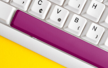 Wall Mural - Different Colored Keyboard key With Accessories Arranged On Empty copy space